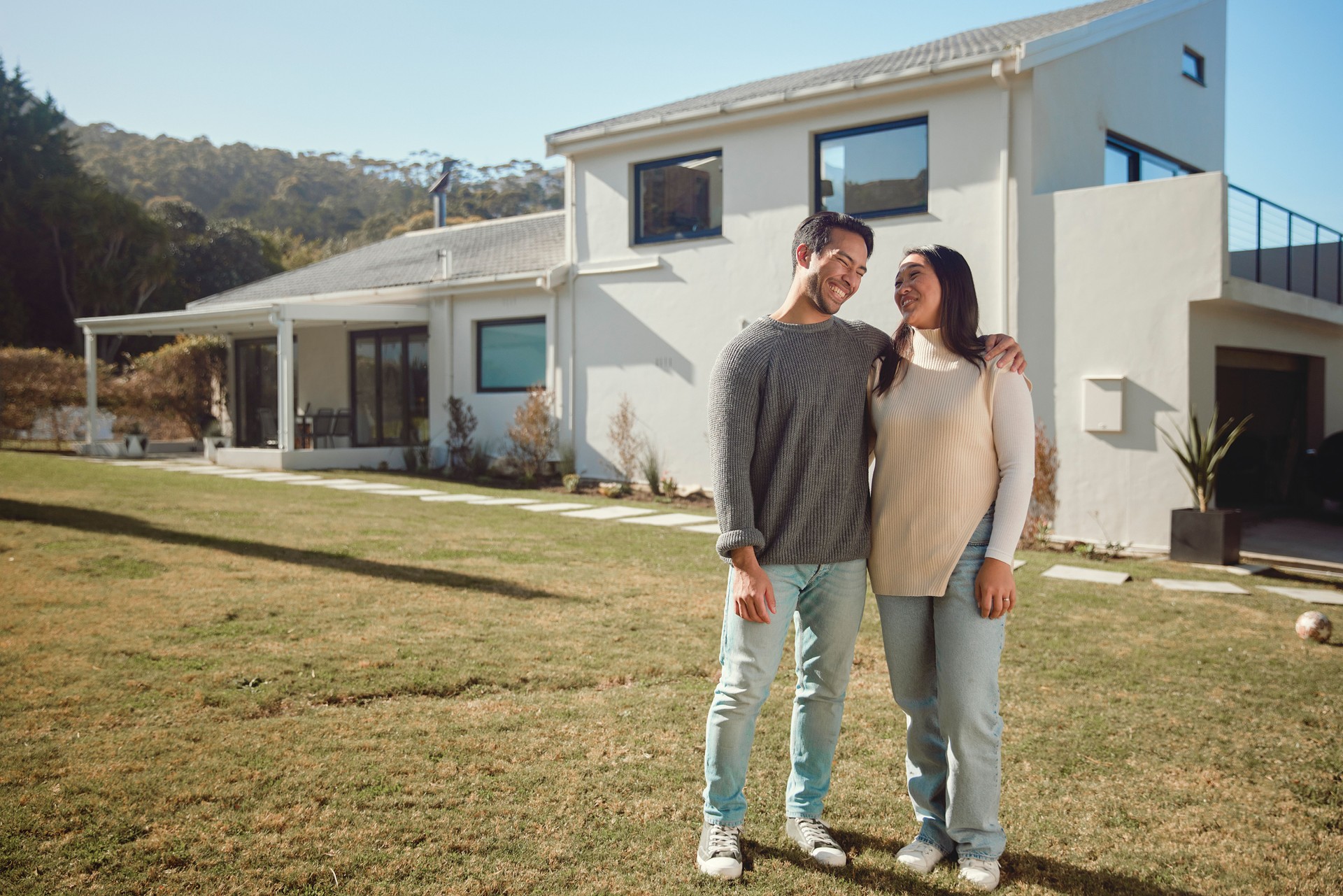 New Beginnings: A Joyful Couple Embracing Their Home Sweet Home